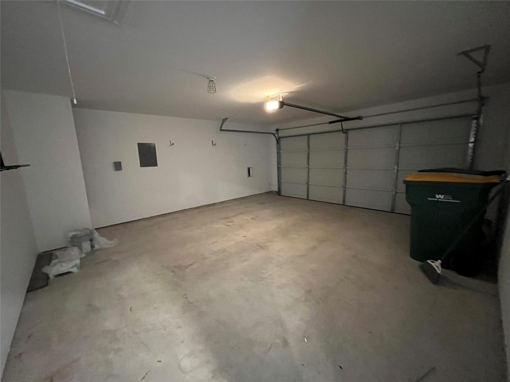 14141 Prospector Way Elgin, TX 78621 - Photo 15 of 16 2 car garage