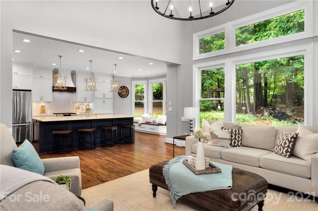 1111 Lytton Lane Matthews, NC 28104 - Photo 11 of 48 a living room with furniture and a large window