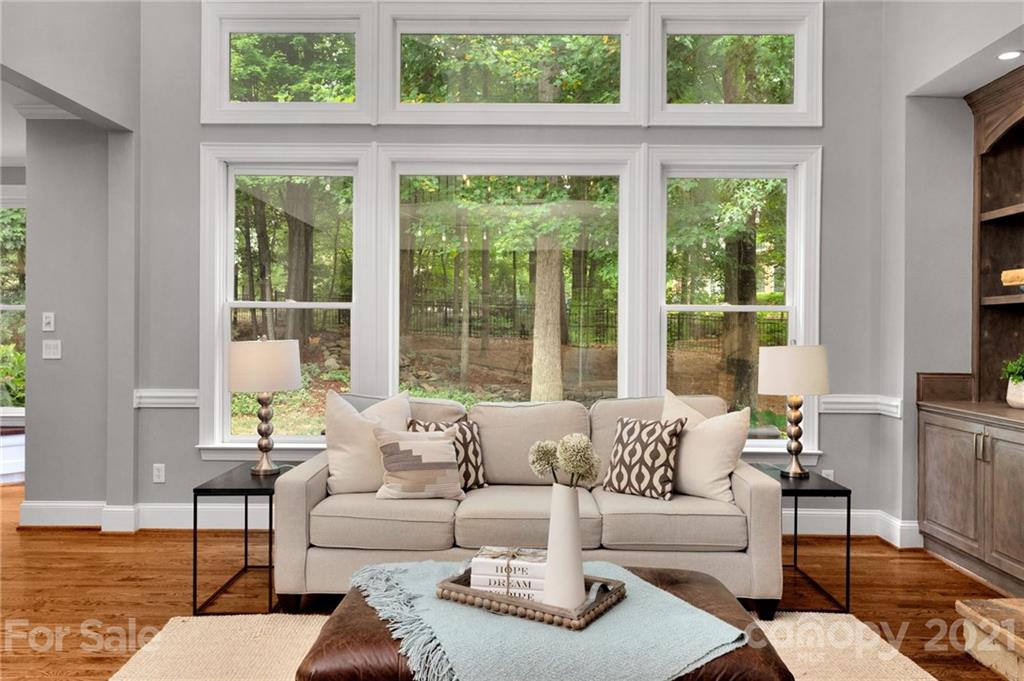1111 Lytton Lane Matthews, NC 28104 - Photo 12 of 48 a living room with furniture and a large window