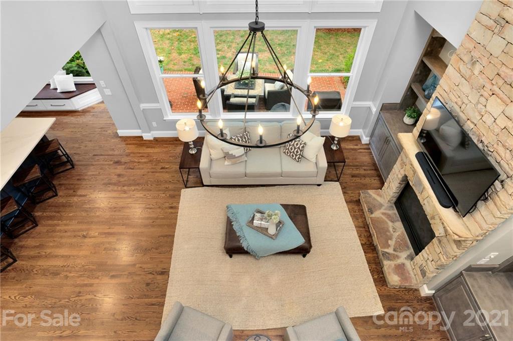 1111 Lytton Lane Matthews, NC 28104 - Photo 14 of 48 a living room with furniture and a fireplace