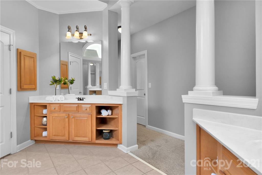 1111 Lytton Lane Matthews, NC 28104 - Photo 27 of 48 a bathroom with a sink vanity and a mirror