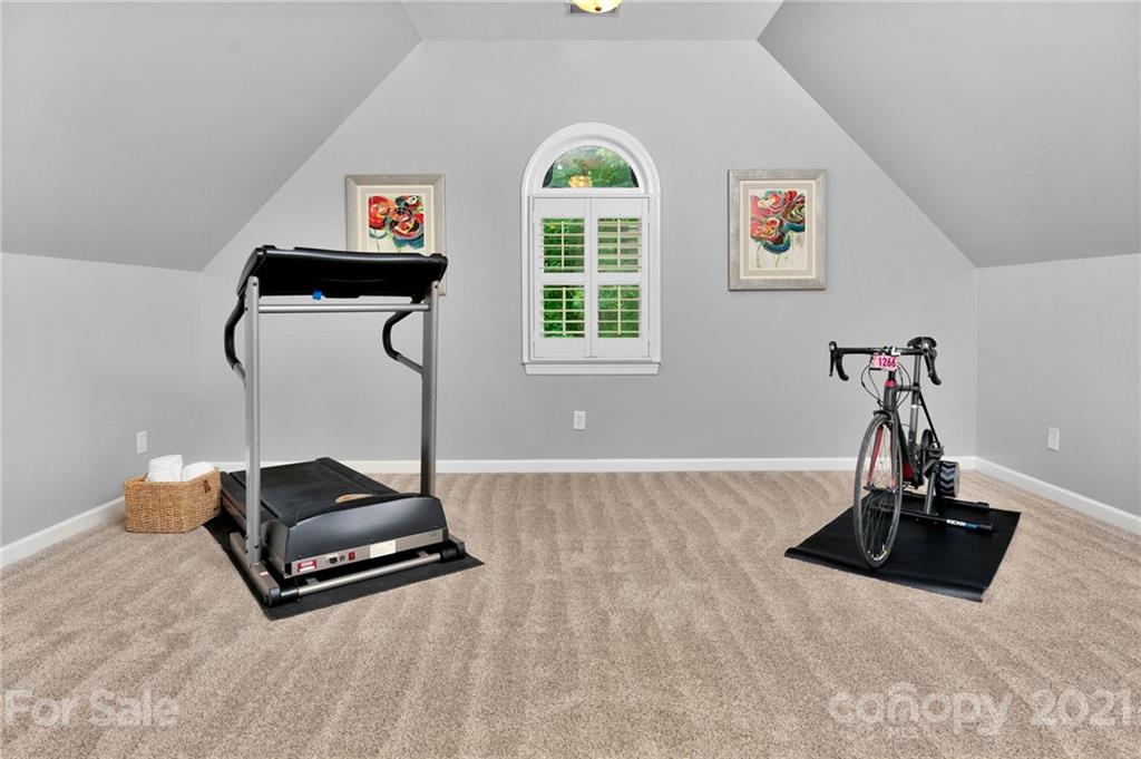 1111 Lytton Lane Matthews, NC 28104 - Photo 28 of 48 a room with gym equipment and a window