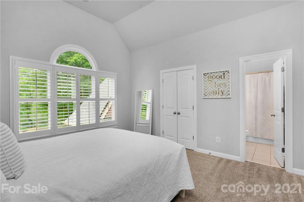 1111 Lytton Lane Matthews, NC 28104 - Photo 30 of 48 a bedroom with a bed and a window