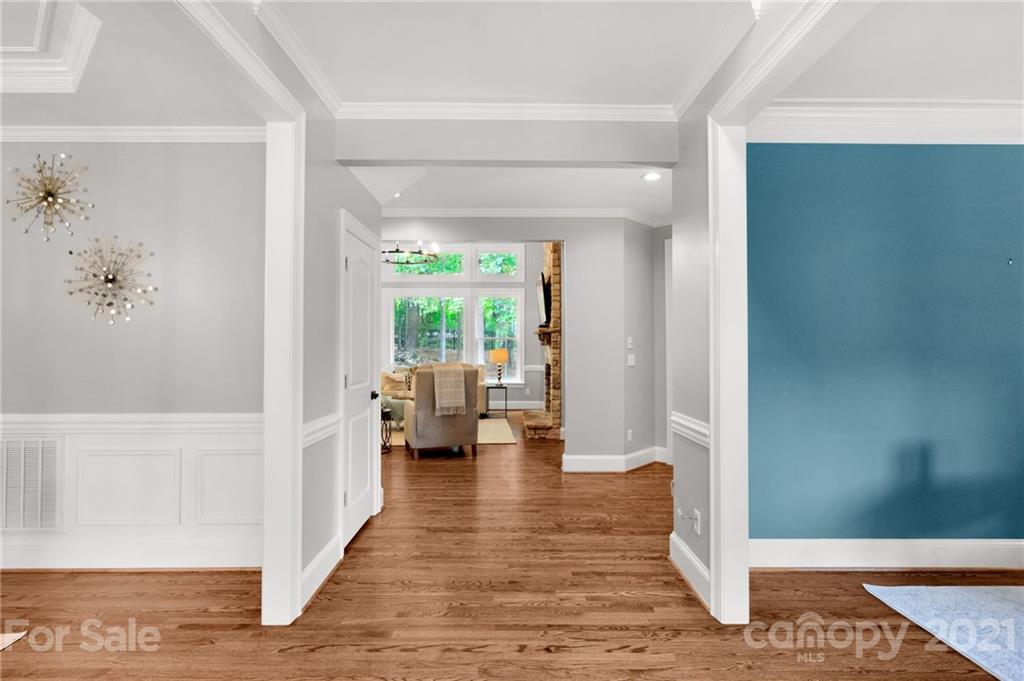 1111 Lytton Lane Matthews, NC 28104 - Photo 4 of 48 a hall with wooden floor and a rug