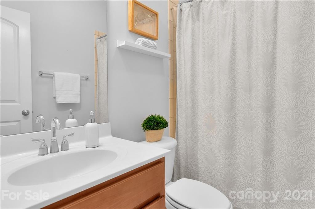 1111 Lytton Lane Matthews, NC 28104 - Photo 31 of 48 a bedroom with a bed and a window