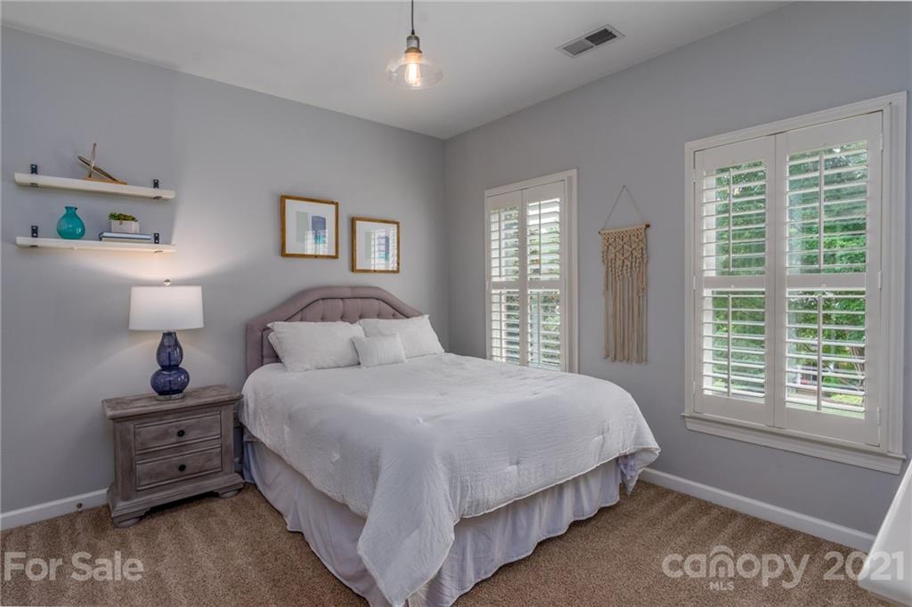 1111 Lytton Lane Matthews, NC 28104 - Photo 32 of 48 a bedroom with a bed and a window