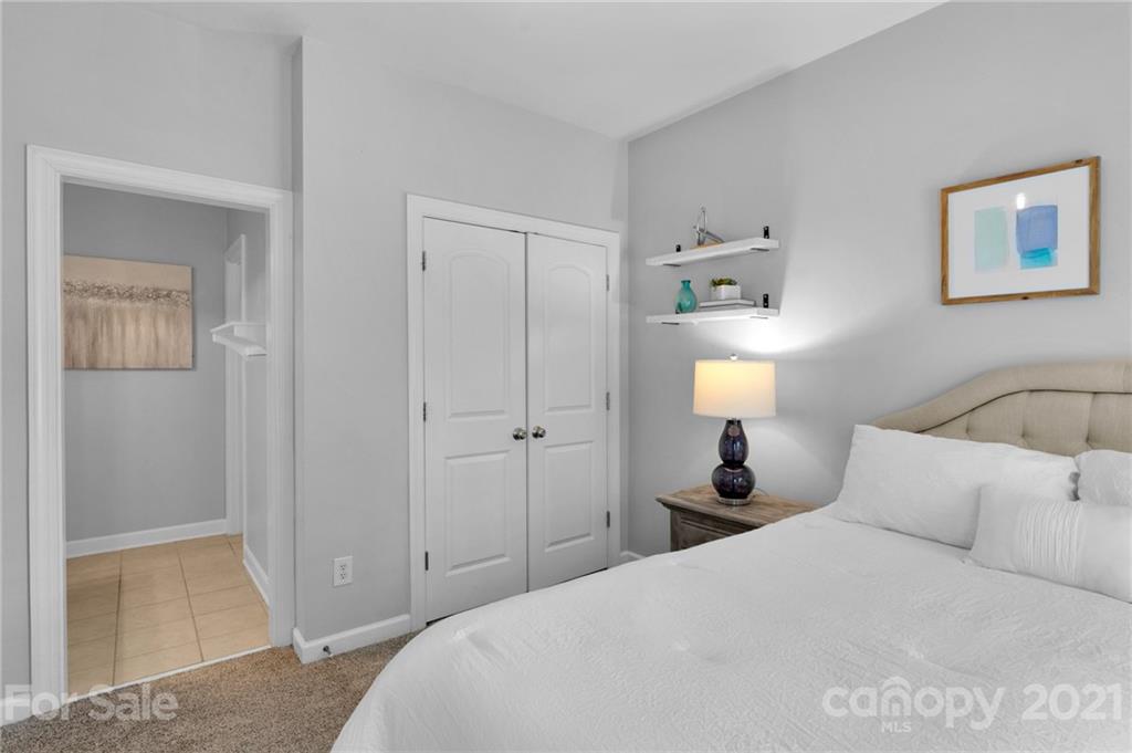 1111 Lytton Lane Matthews, NC 28104 - Photo 33 of 48 a bedroom with a bed and a window