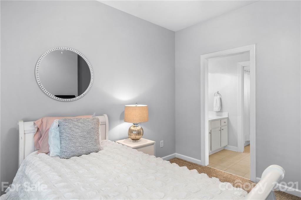 1111 Lytton Lane Matthews, NC 28104 - Photo 36 of 48 a bedroom with a bed and a window