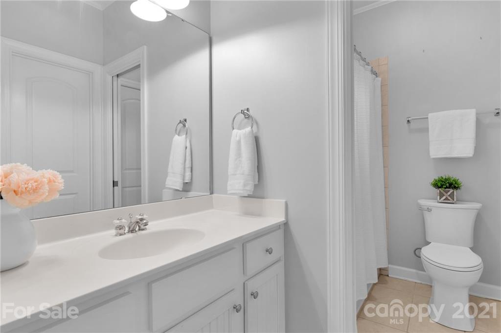 1111 Lytton Lane Matthews, NC 28104 - Photo 37 of 48 a bathroom with a sink toilet and shower