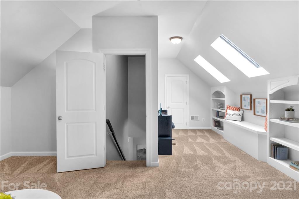 1111 Lytton Lane Matthews, NC 28104 - Photo 40 of 48 a living room with furniture and a flat screen tv