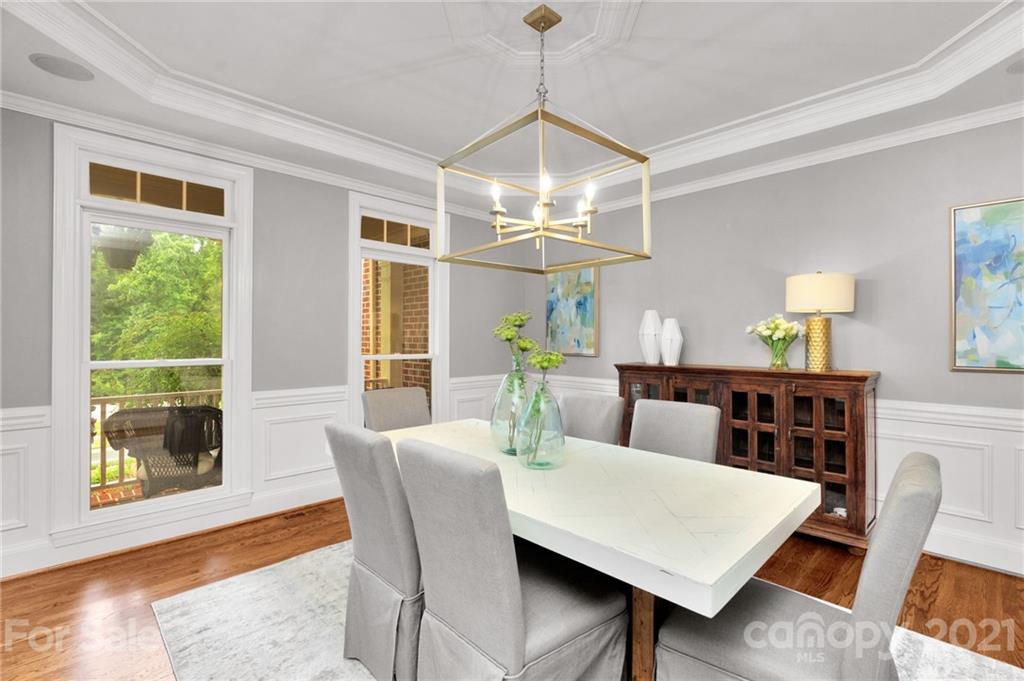 1111 Lytton Lane Matthews, NC 28104 - Photo 5 of 48 a view of a dining room with furniture window and wooden floor