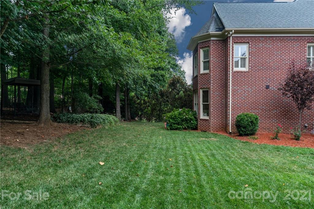 1111 Lytton Lane Matthews, NC 28104 - Photo 45 of 48 front view of a house with a yard