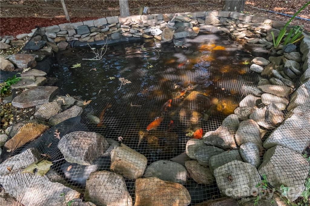 1111 Lytton Lane Matthews, NC 28104 - Photo 47 of 48 a outdoor living space with furniture and garden view