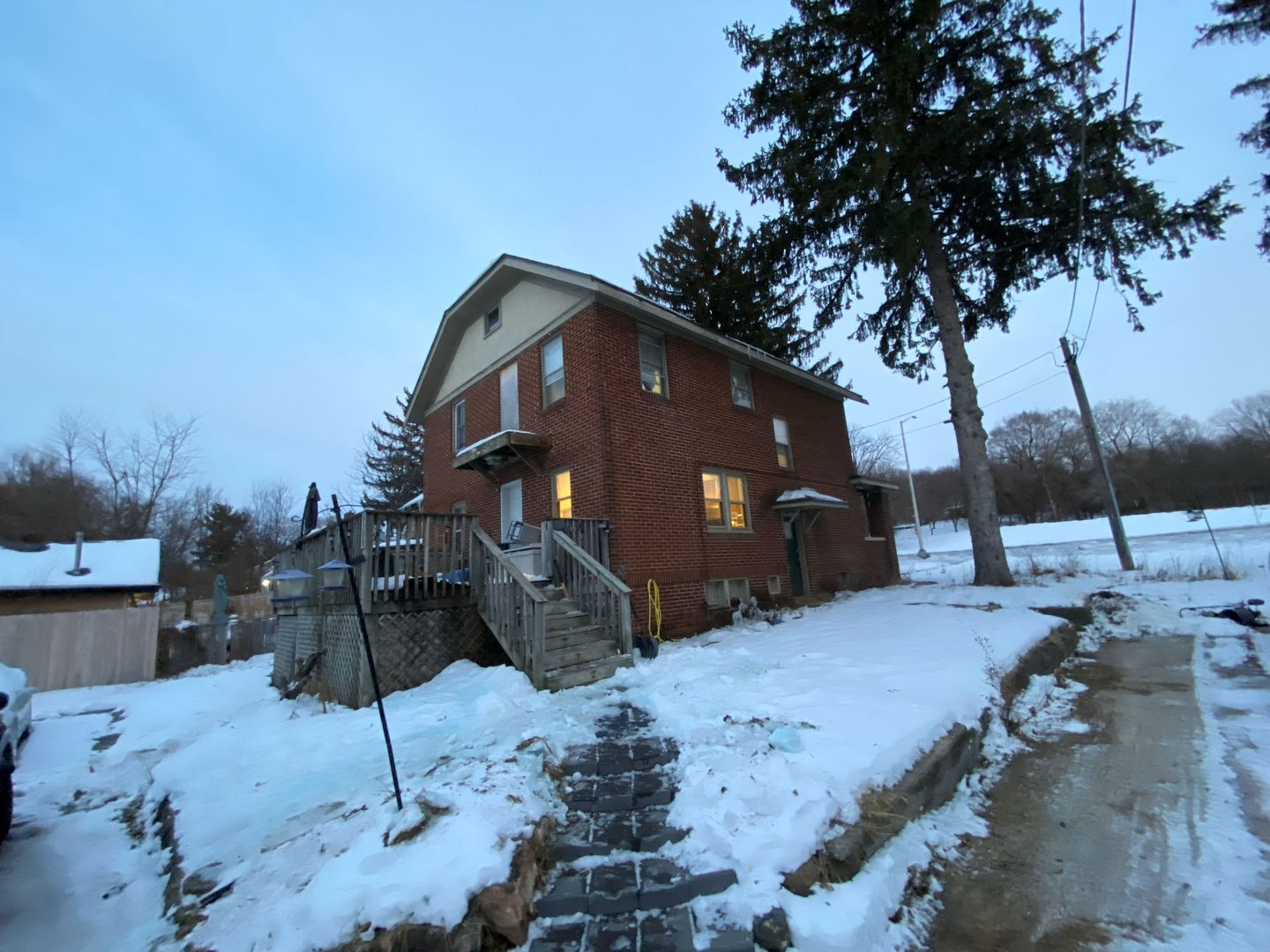 4708 Forest Hills Road Loves Park, IL 61111 - Photo 3 of 4 a view of a house with a snow in the yard