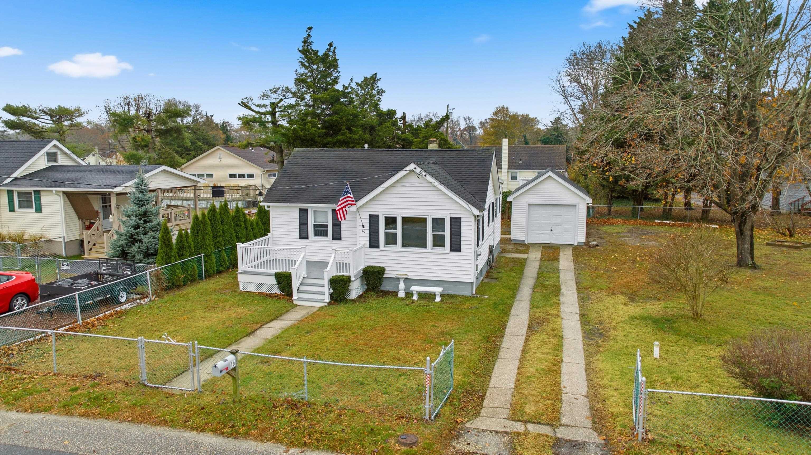 16 East Drumbed Road Villas, NJ 08251 - Photo 1 of 28 a front view of a house with yard
