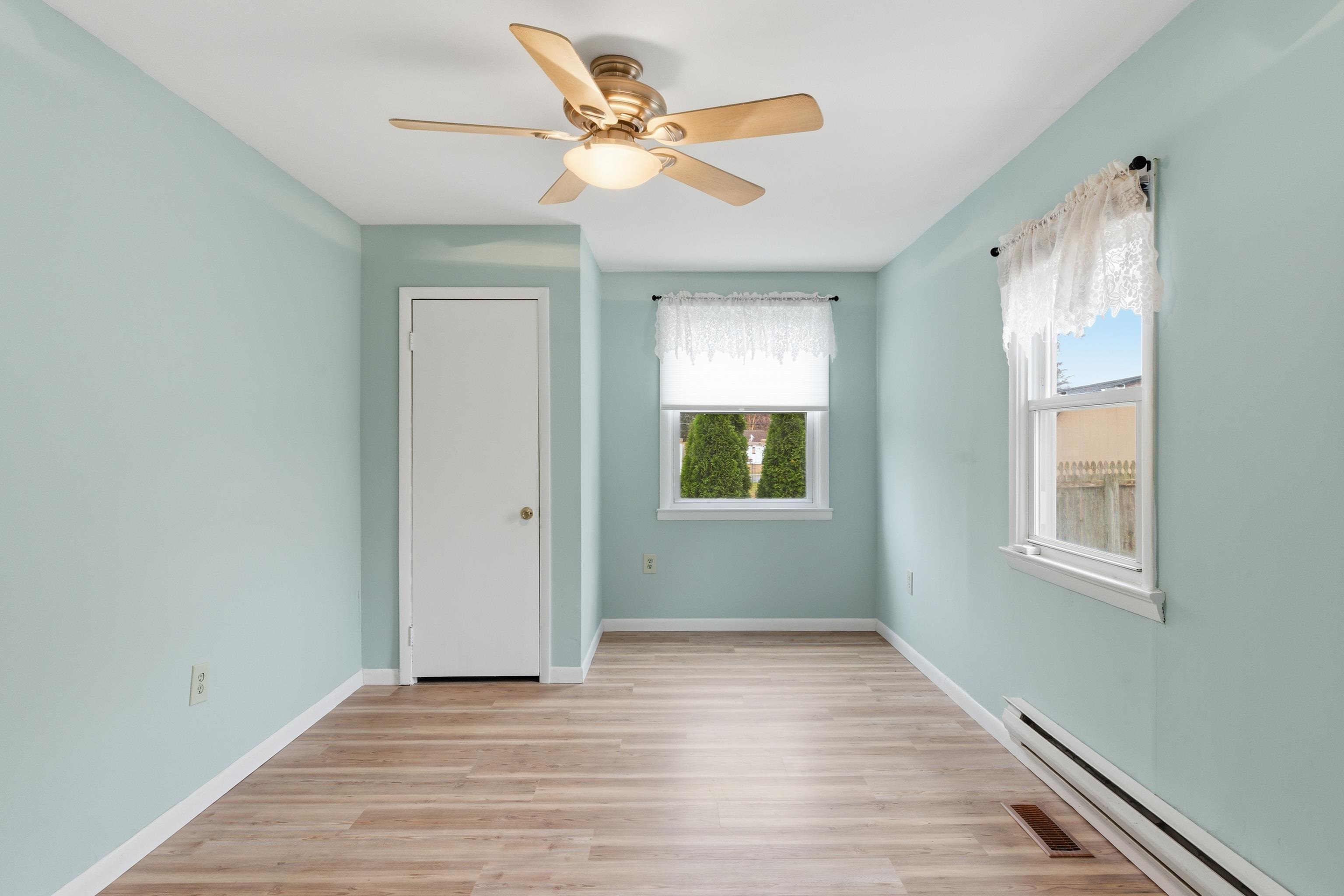 16 East Drumbed Road Villas, NJ 08251 - Photo 21 of 28 a view of an empty room with a window and wooden floor