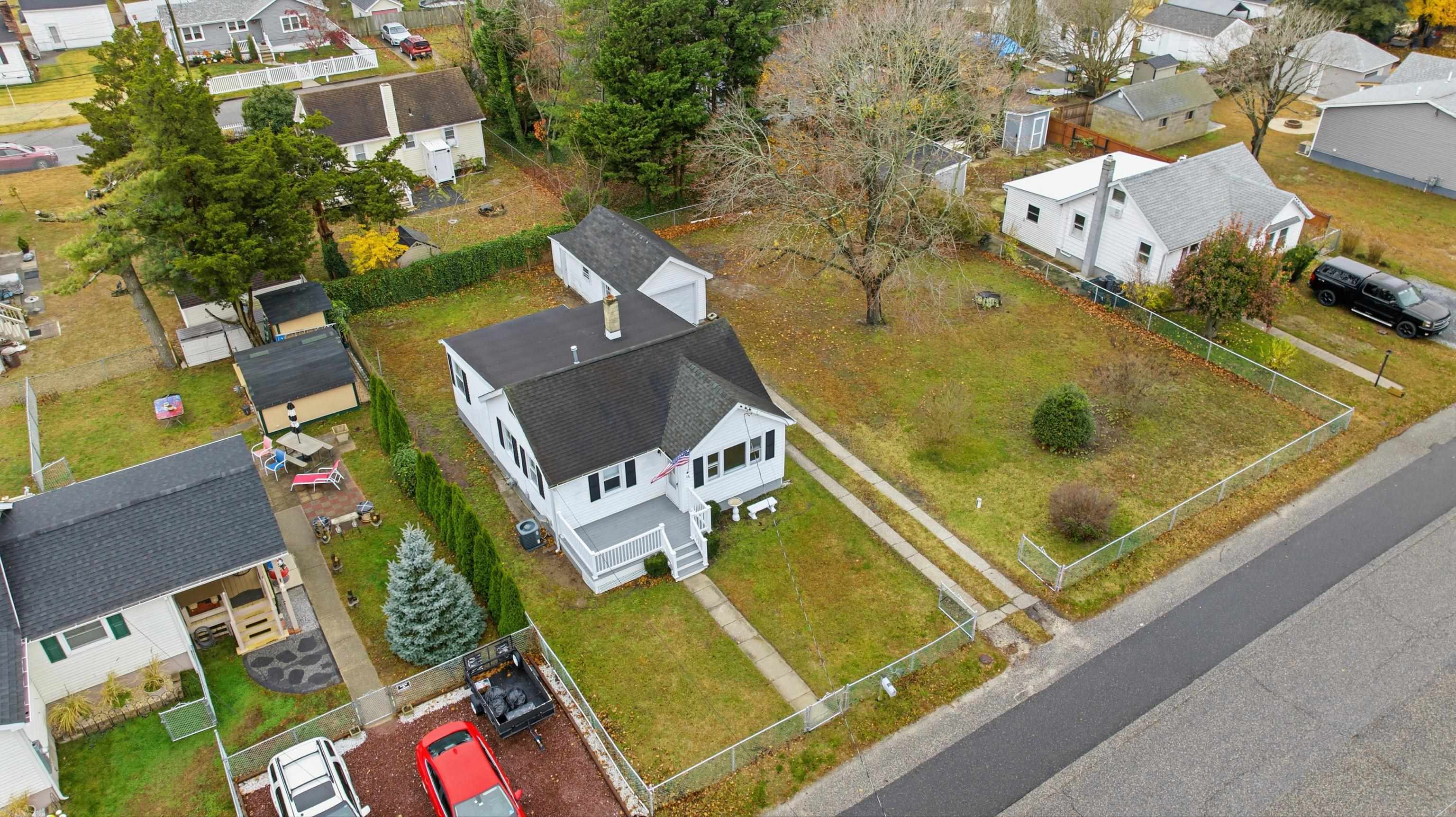16 East Drumbed Road Villas, NJ 08251 - Photo 3 of 28 an aerial view of residential house with outdoor space and swimming pool