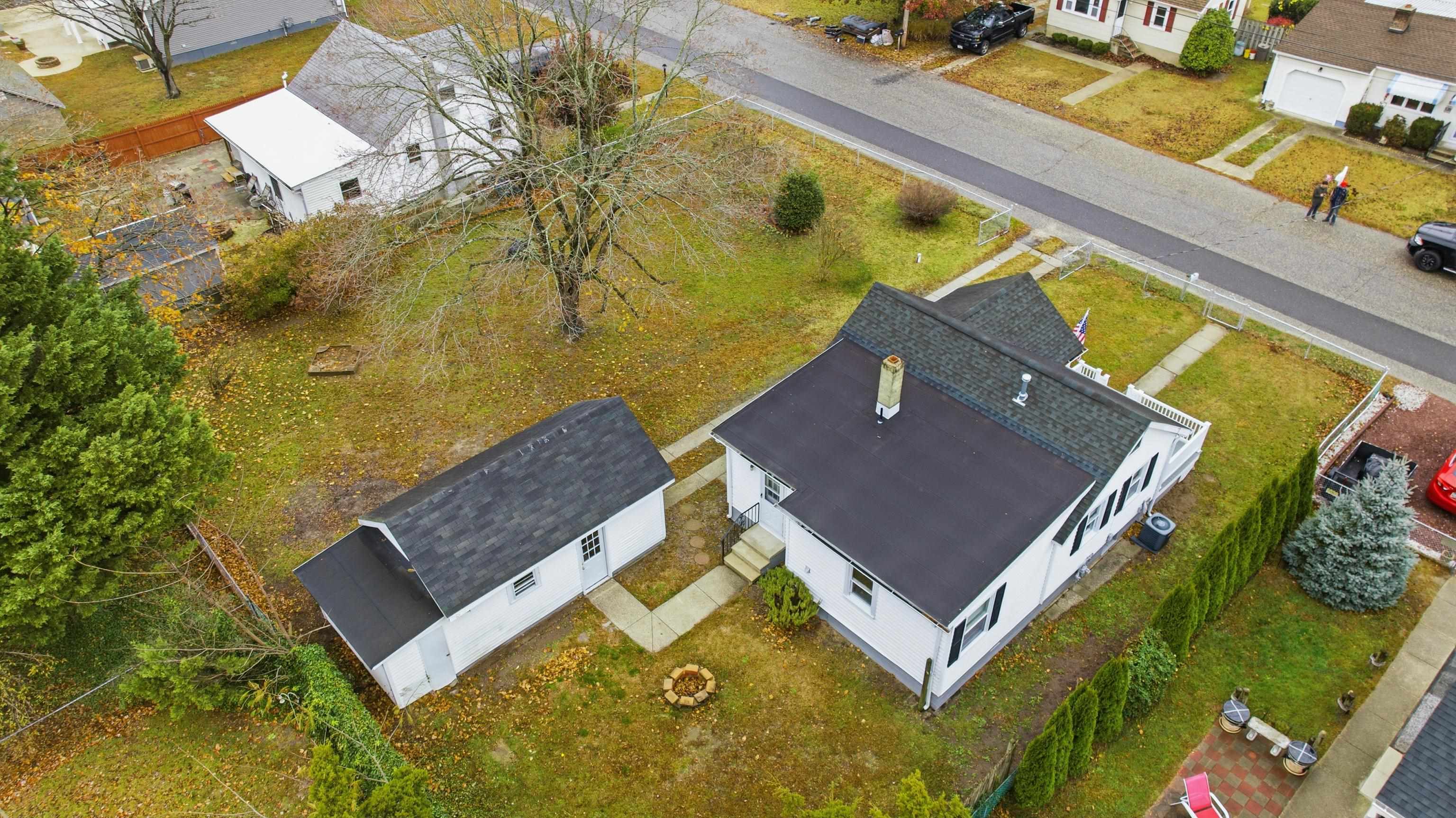 16 East Drumbed Road Villas, NJ 08251 - Photo 4 of 28 an aerial view of a house with a yard