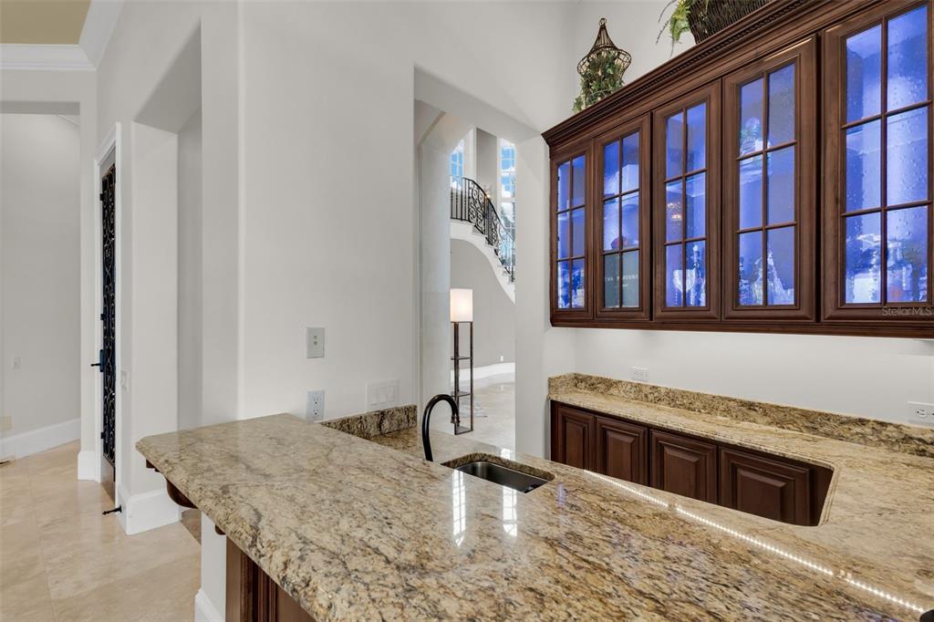 5417 Osprey Isle Lane Windermere, FL 34786 - Photo 14 of 45 a kitchen with stainless steel appliances granite countertop a stove and a sink