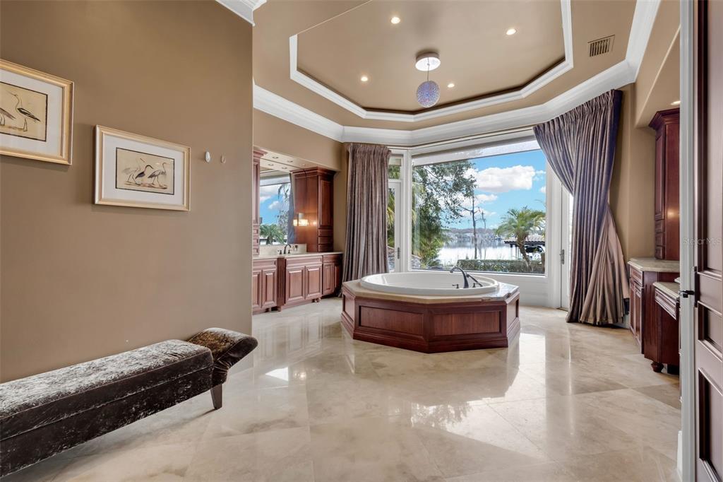 5417 Osprey Isle Lane Windermere, FL 34786 - Photo 30 of 45 a living room with furniture and a flat screen tv