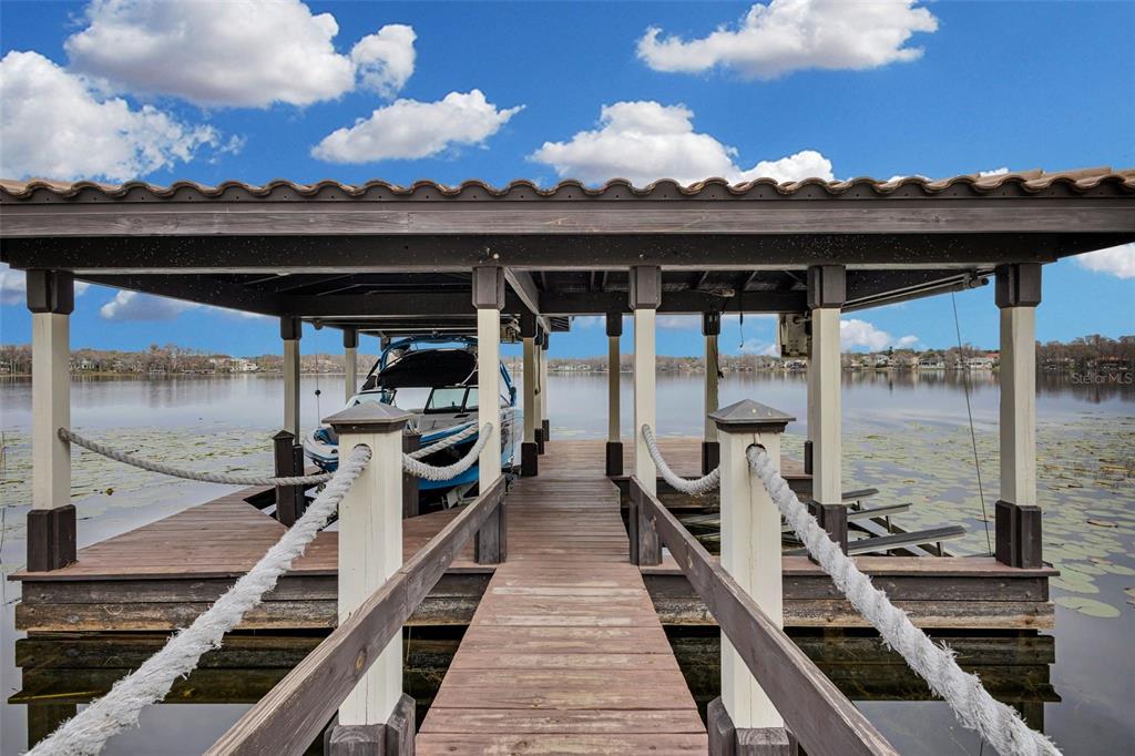 5417 Osprey Isle Lane Windermere, FL 34786 - Photo 42 of 45 a view of a balcony with chairs
