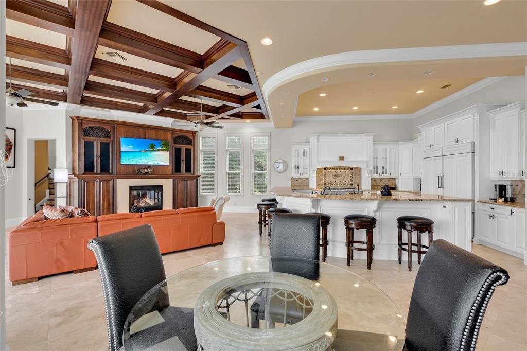 5417 Osprey Isle Lane Windermere, FL 34786 - Photo 7 of 45 a large kitchen with a table and chairs