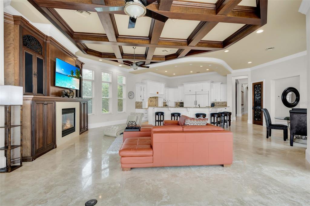 5417 Osprey Isle Lane Windermere, FL 34786 - Photo 10 of 45 a kitchen with stainless steel appliances kitchen island granite countertop a stove and a sink with cabinets