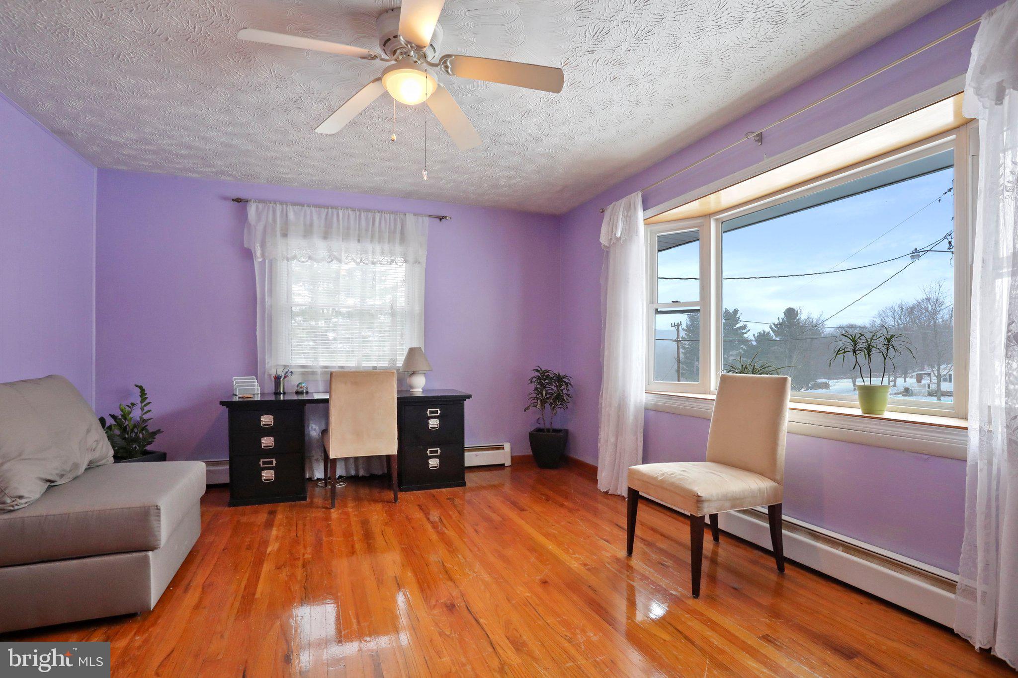 19018 Kerr Road Southwest Frostburg, MD 21532 - Photo 13 of 37 The living room which features a large bay window!