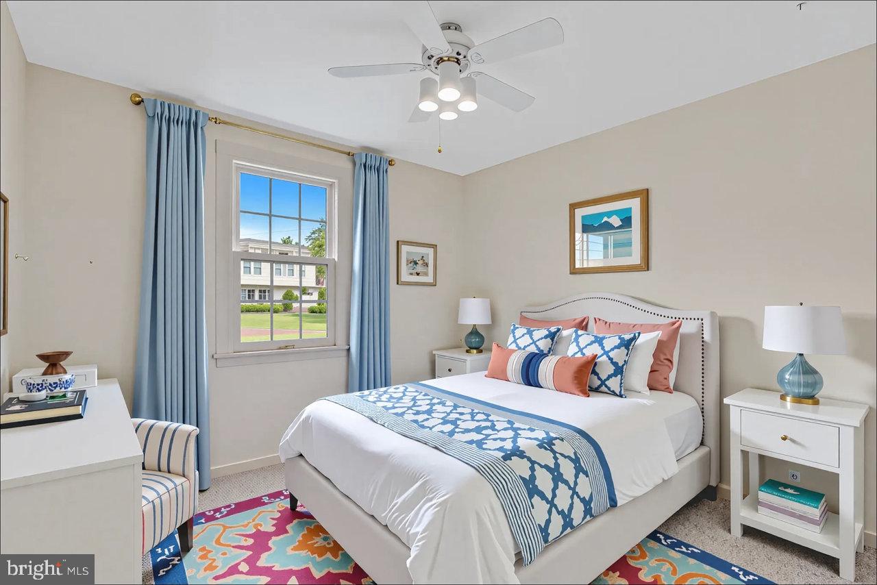 114 Pelham Road Delran, NJ 08075 - Photo 11 of 18 a bedroom with a bed and a chandelier