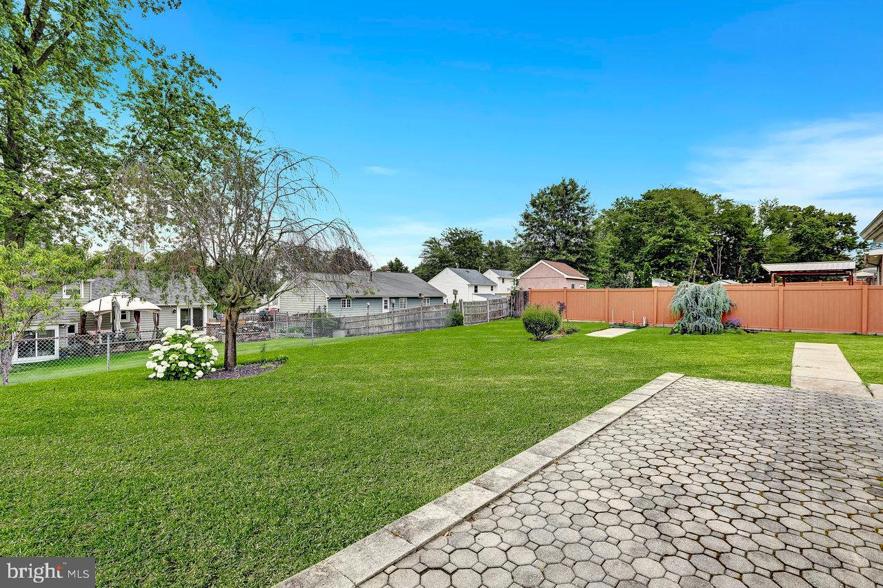 114 Pelham Road Delran, NJ 08075 - Photo 15 of 18 a view of a garden with houses