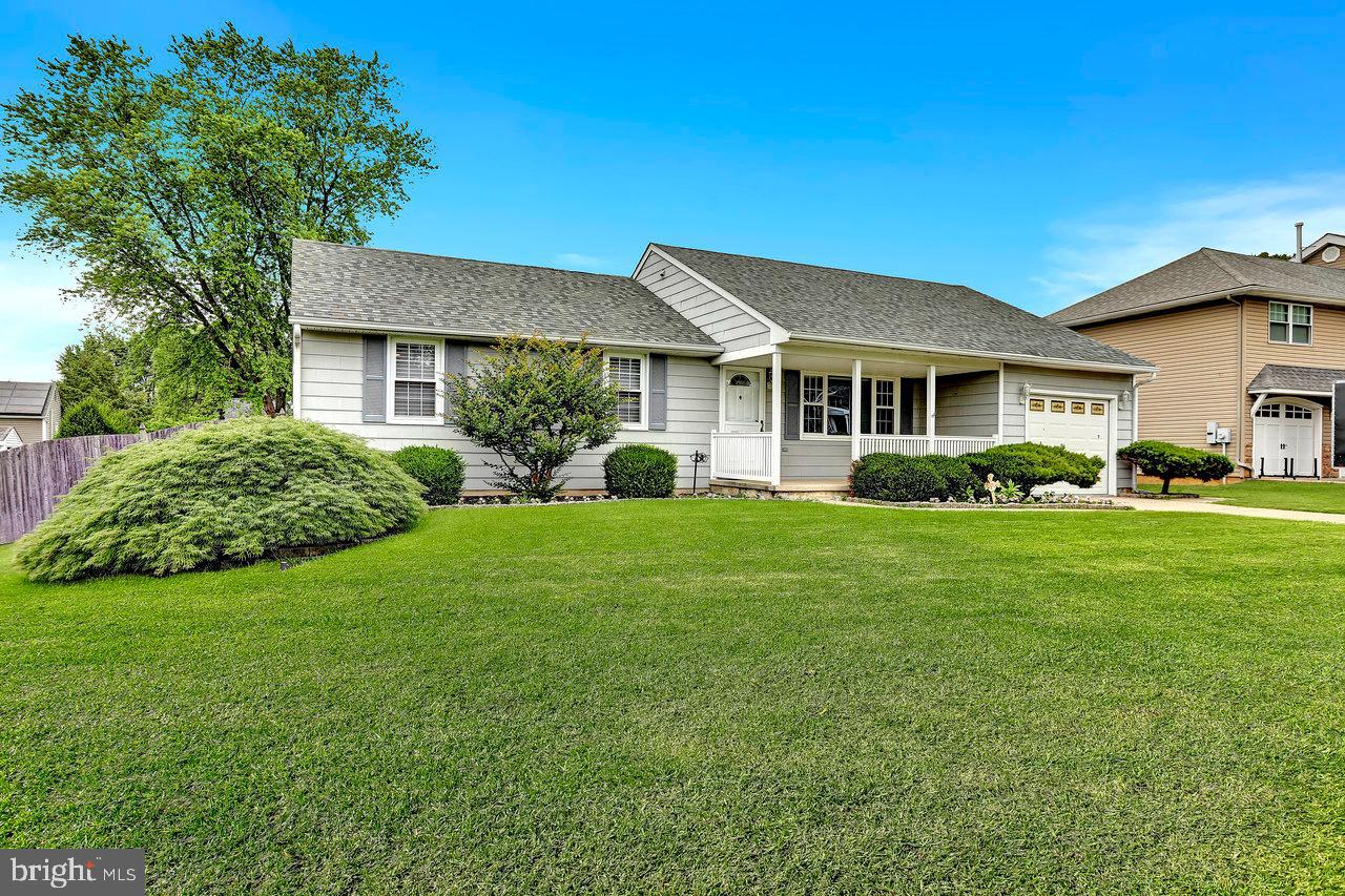 114 Pelham Road Delran, NJ 08075 - Photo 3 of 18 a front view of a house with a garden