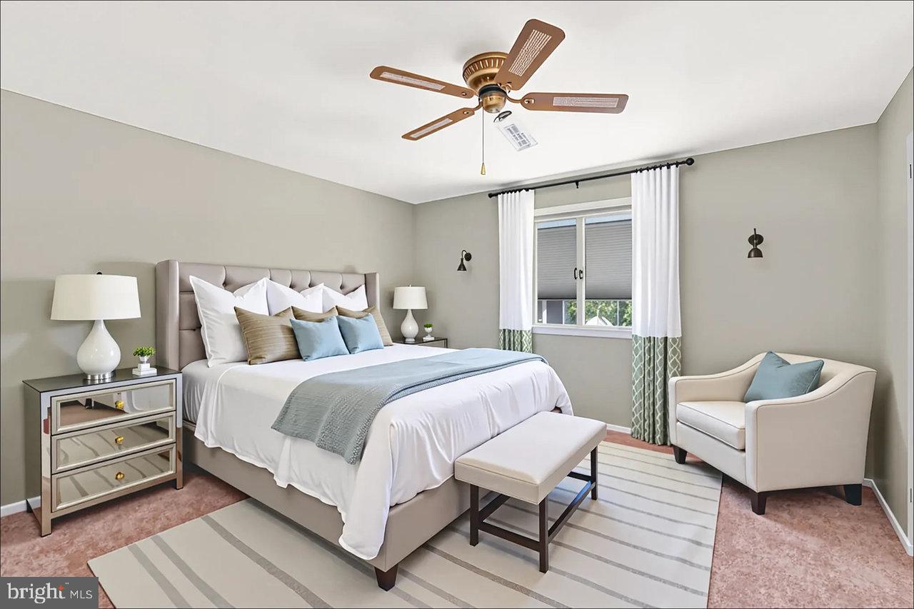 114 Pelham Road Delran, NJ 08075 - Photo 10 of 18 a bedroom with a bed and a couch
