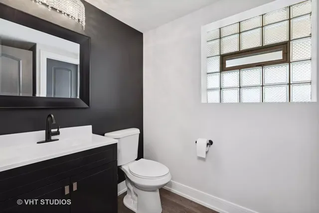 a bathroom with a sink and a toilet