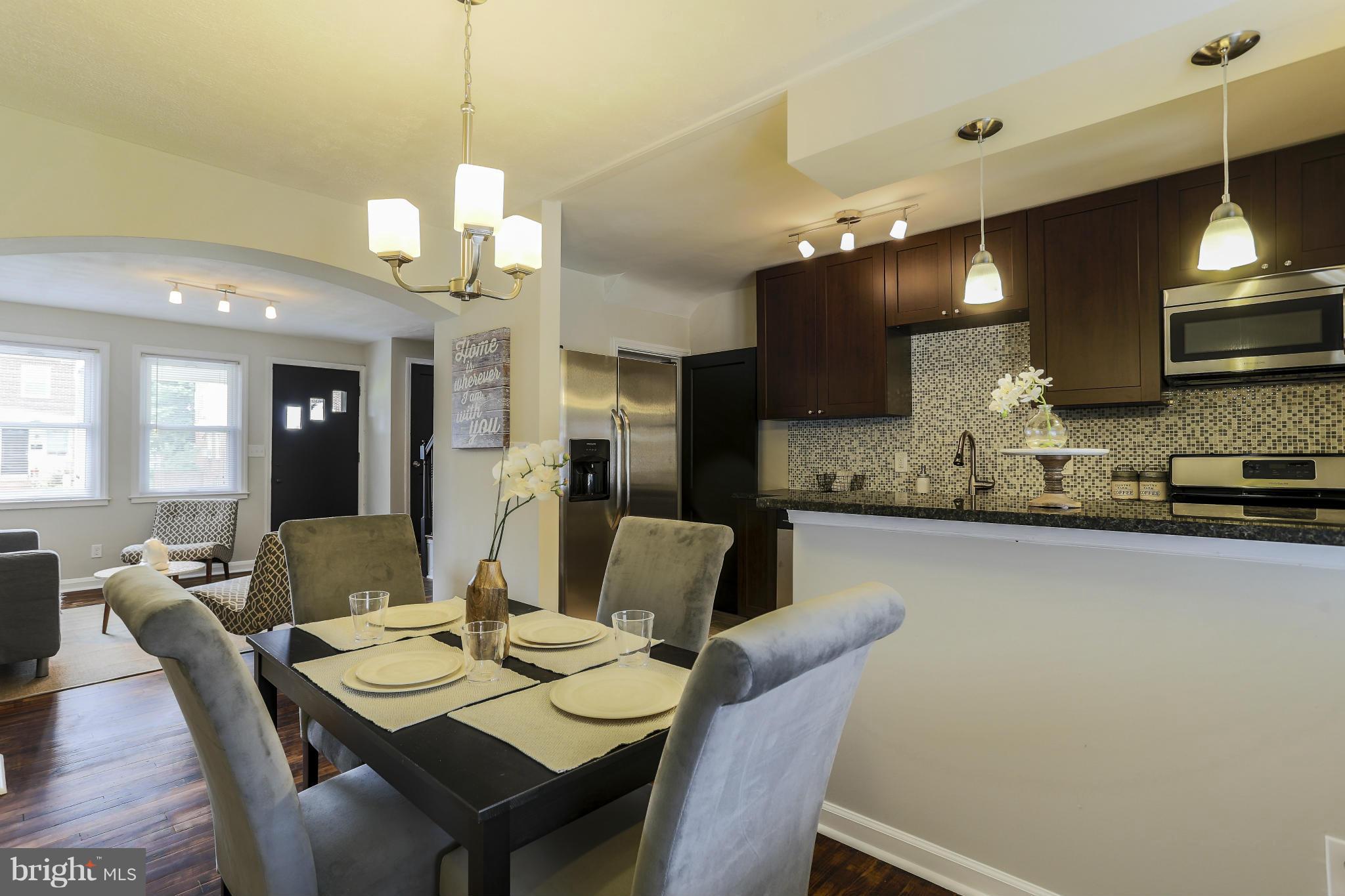6923 Belclare Road Baltimore, MD 21222 - Photo 2 of 23 a view of a dining room with furniture