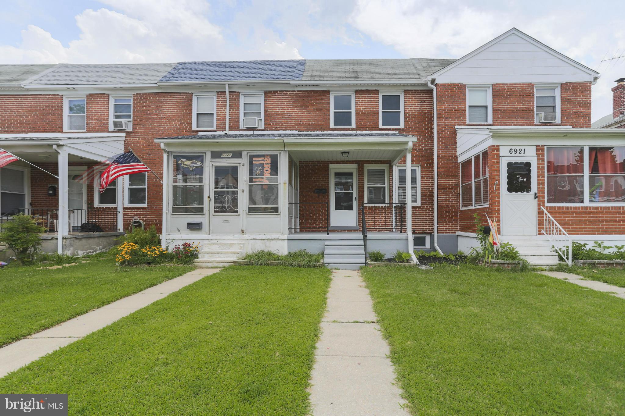 6923 Belclare Road Baltimore, MD 21222 - Photo 21 of 23 a front view of a house with a yard