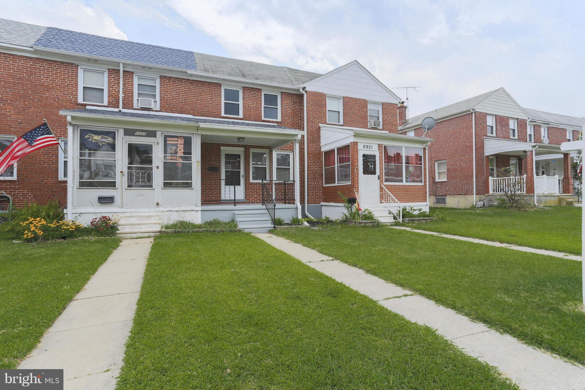 6923 Belclare Road Baltimore, MD 21222 - Photo 23 of 23 a front view of a building with a yard