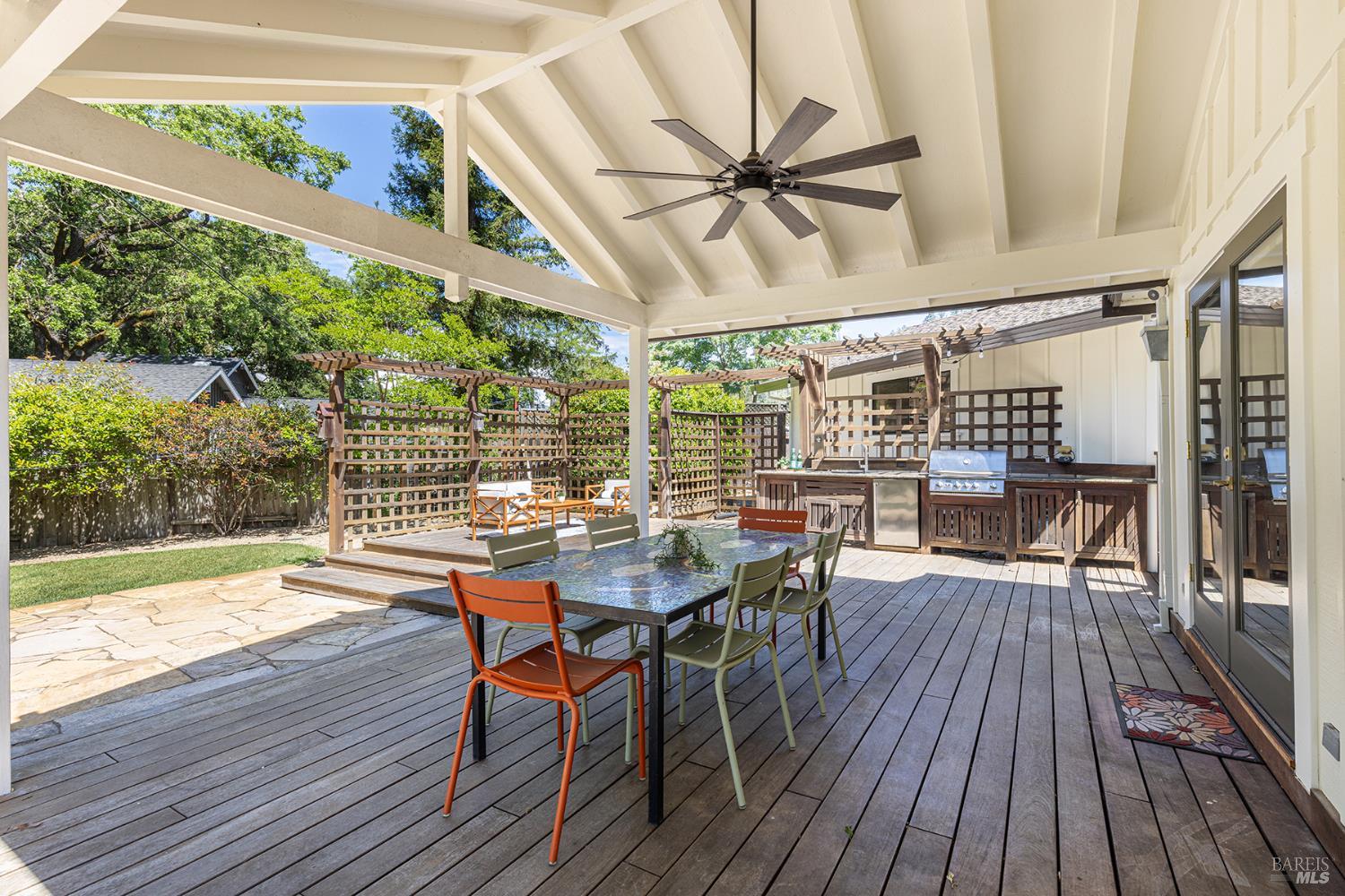 14734 Young Road Healdsburg, CA 95448 - Photo 10 of 47 a dining room with a wooden table and chairs