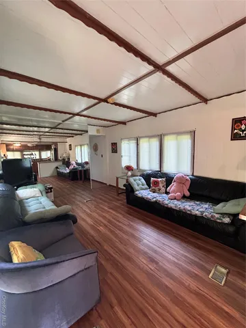 a living room with furniture and a couch