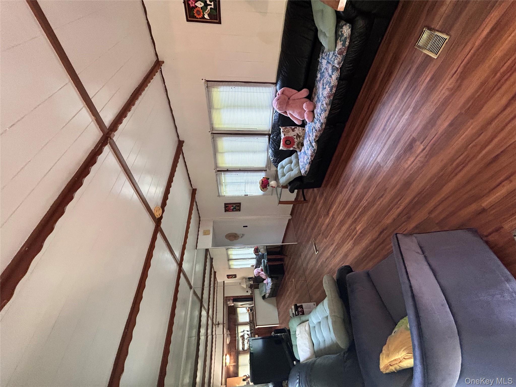 98 Buff Road Cochecton, NY 12726 - Photo 4 of 13 a living room with furniture and a couch