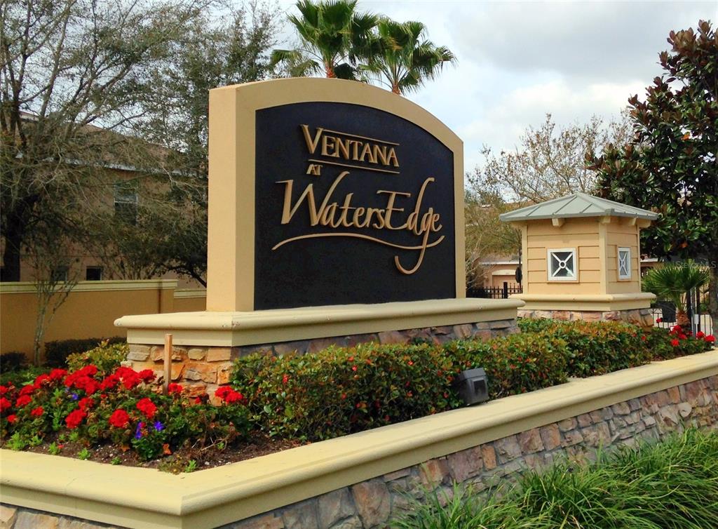 11807 Castine Street New Port Richey, FL 34654 - Photo 27 of 41 a view of sign board with flower around