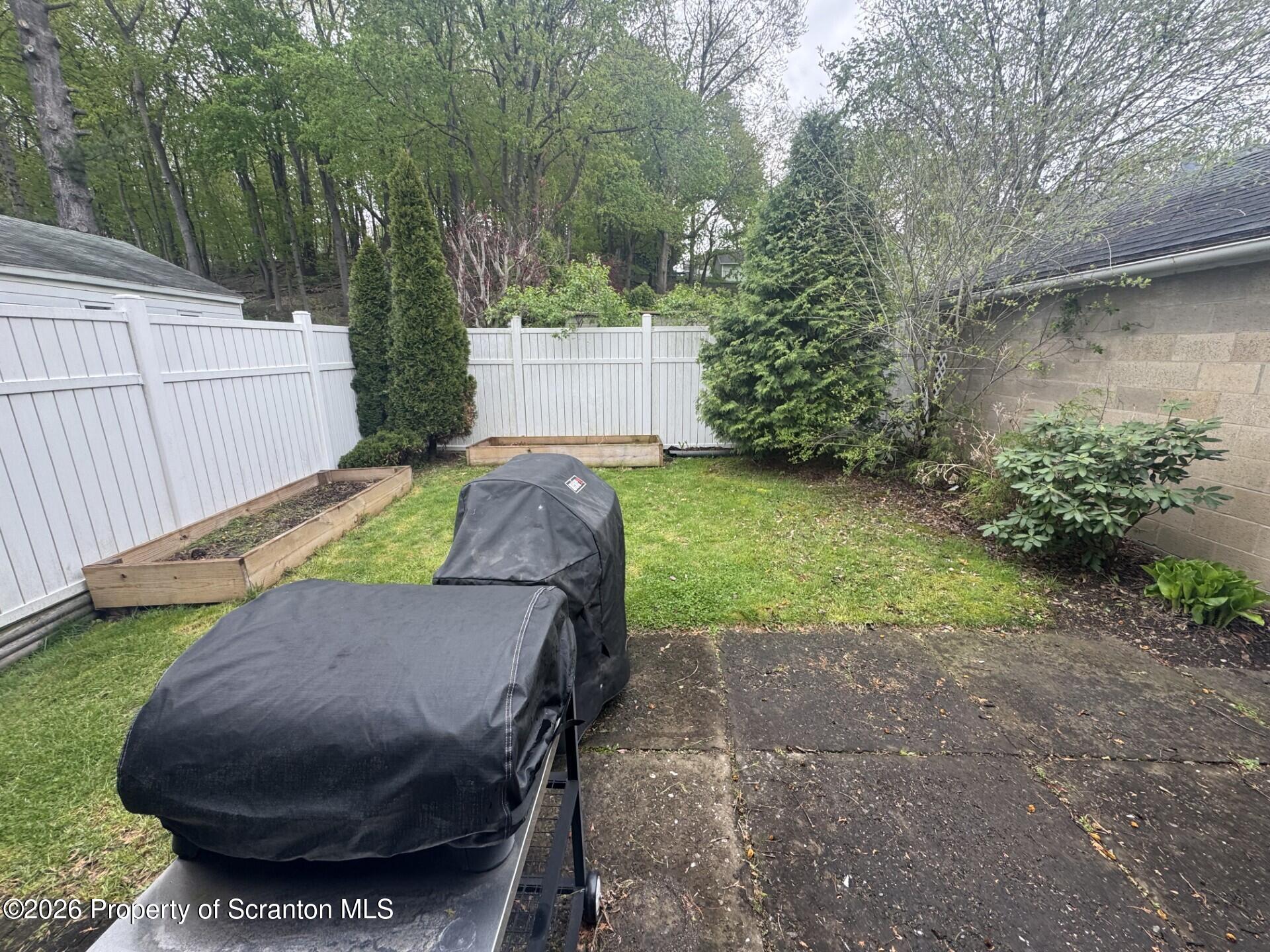 2220 Capouse Avenue Scranton, PA 18509 - Photo 12 of 18 a view of backyard with deck and outdoor seating