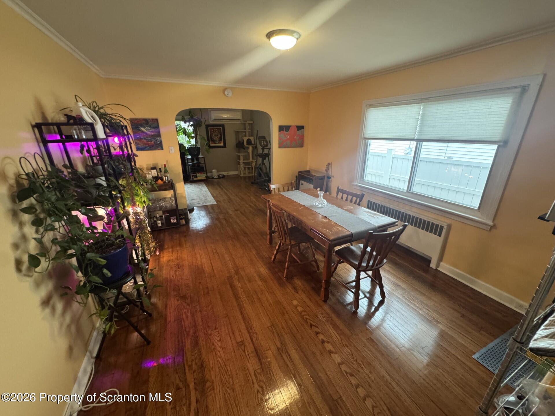 2220 Capouse Avenue Scranton, PA 18509 - Photo 6 of 18 a living room with furniture and a potted plant