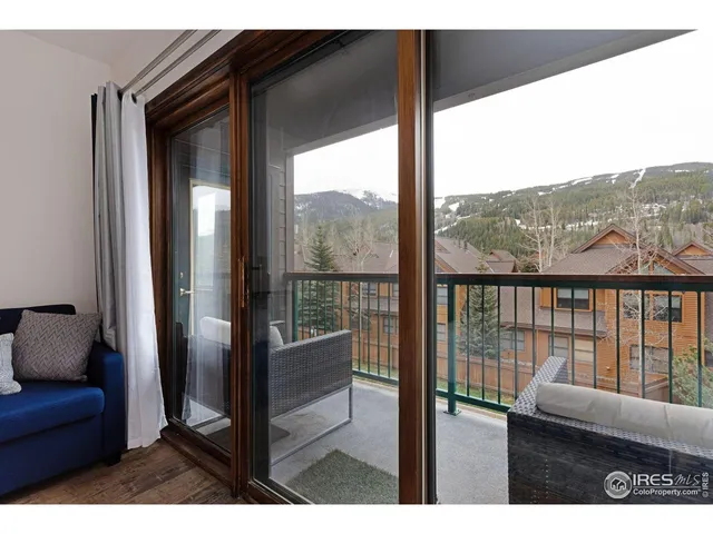 a bathroom with a double vanity sink mirror and toilet