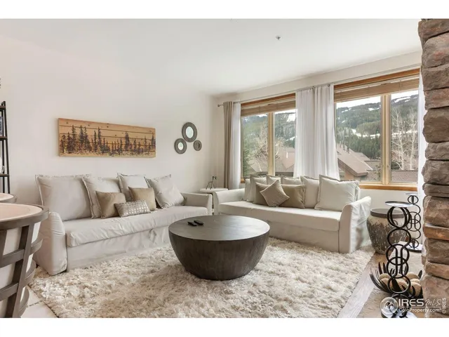 a view of a hallway with washer and dryer