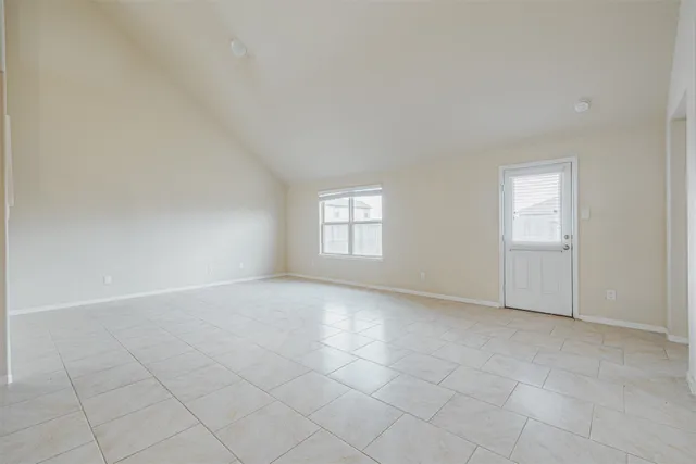 an empty room with windows