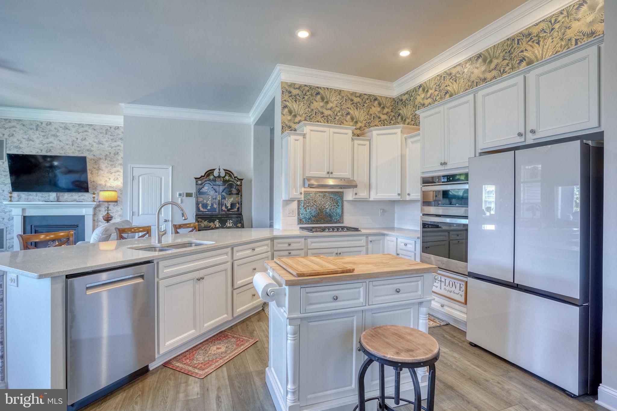 15272 Crape Myrtle Road Milton, DE 19968 - Photo 43 of 61 Bright and airy modern kitchen space.