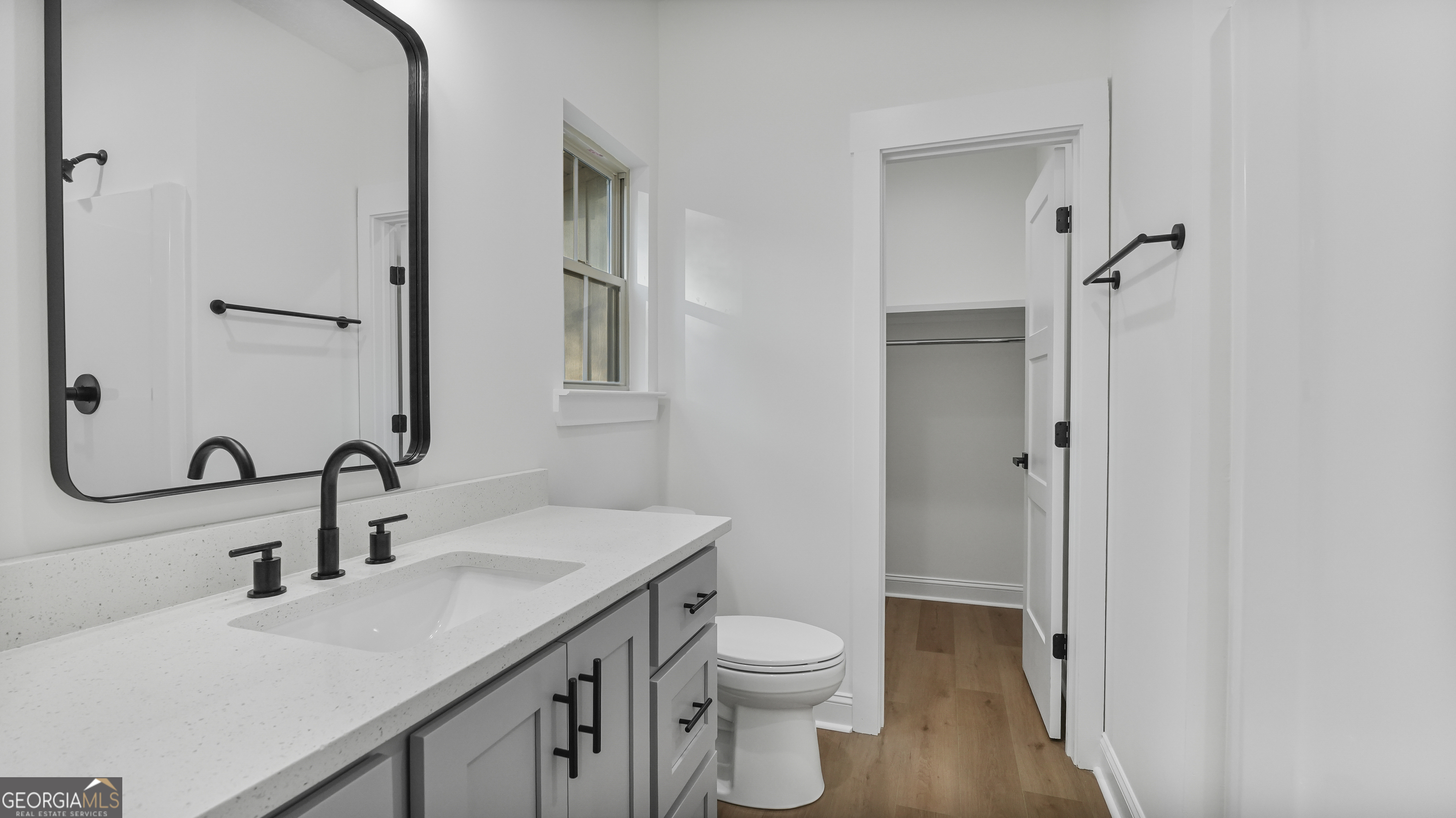 150 Lakeview Drive Jesup, GA 31545 - Photo 23 of 34 a bathroom with a sink toilet and shower