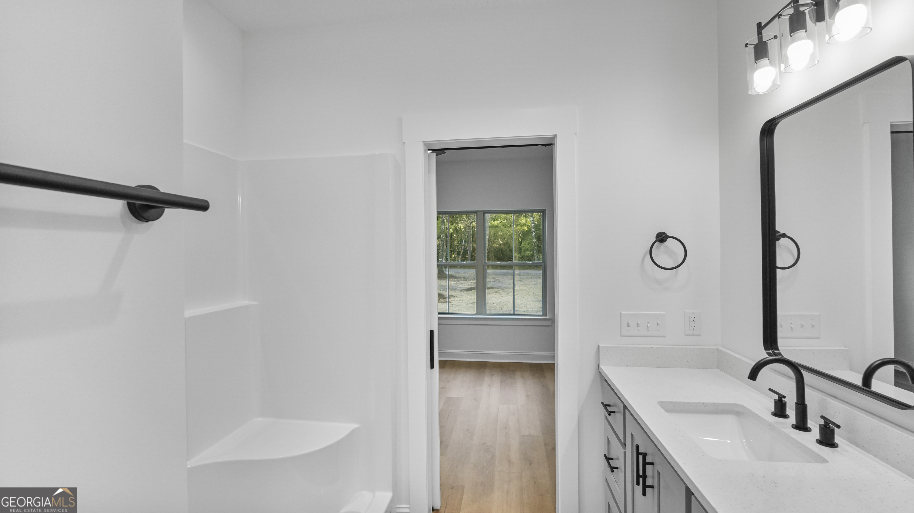 150 Lakeview Drive Jesup, GA 31545 - Photo 26 of 34 a bathroom with a sink a toilet and shower