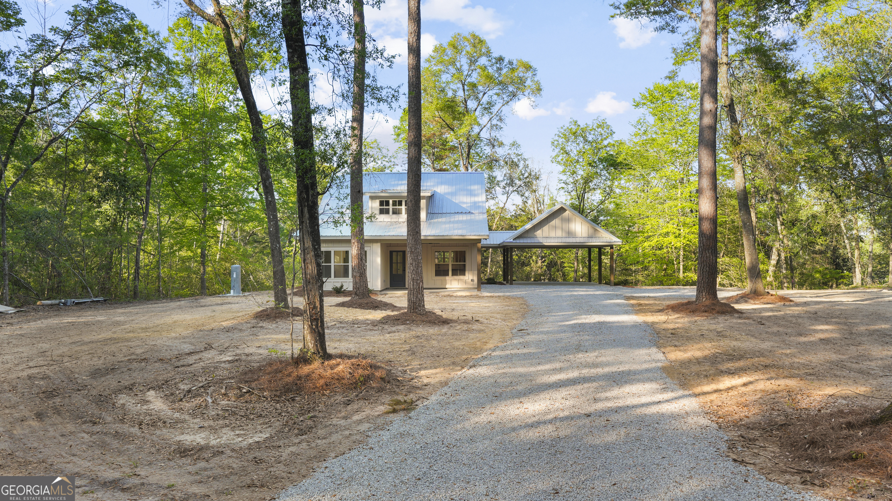 150 Lakeview Drive Jesup, GA 31545 - Photo 6 of 34 a view of a house with basketball court