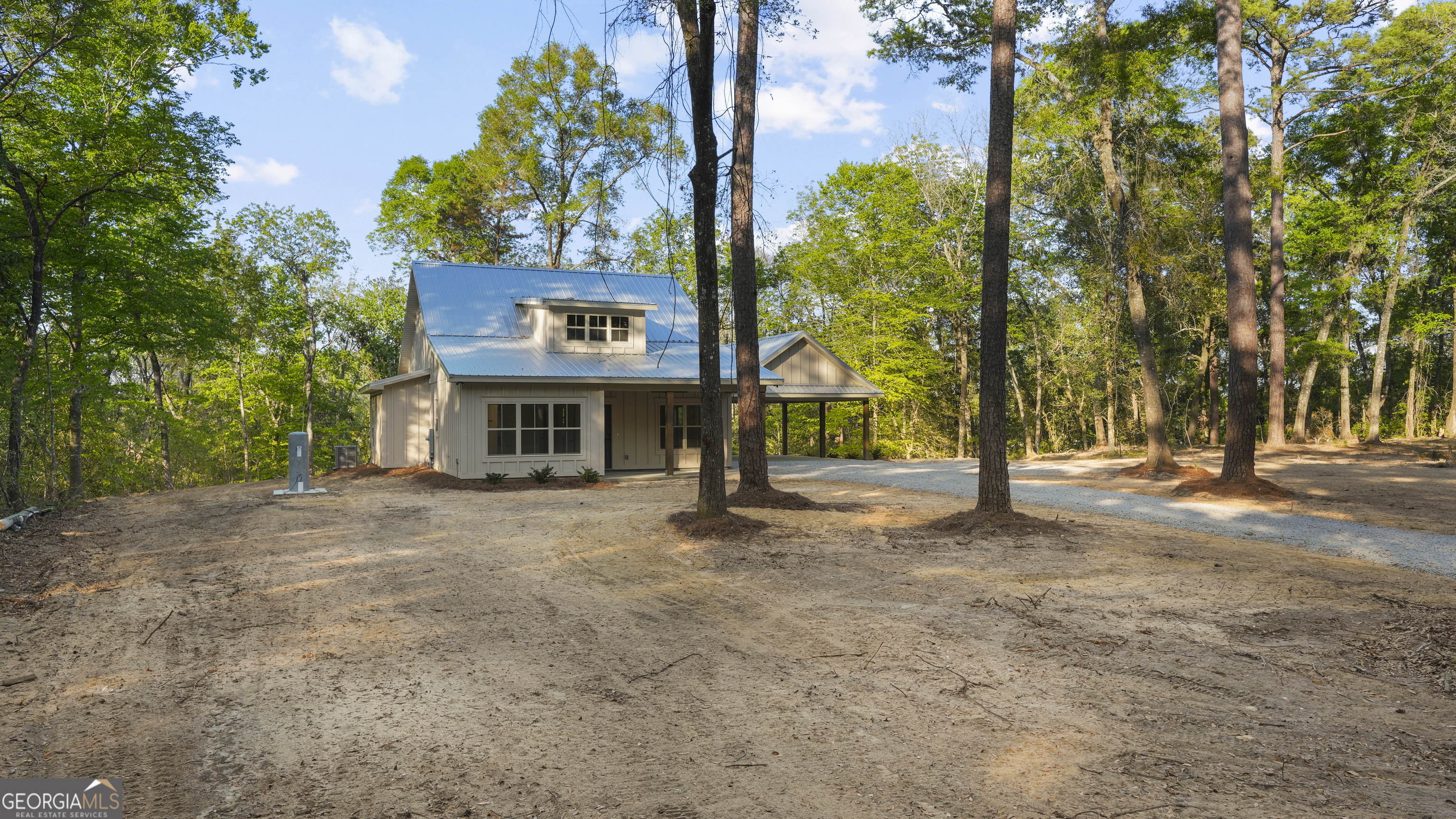 150 Lakeview Drive Jesup, GA 31545 - Photo 7 of 34 a front view of a house with a tree
